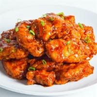 Spicy Galbi Wings · Hot. Sweet and savory, yet a deliciously spicy sauced off the grill flavor. Mixed with green...