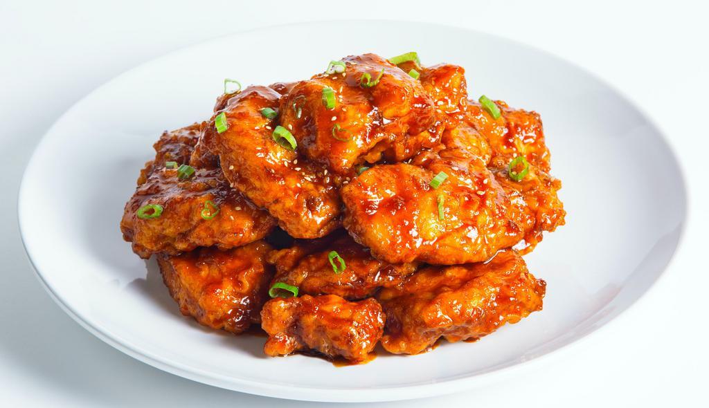 Spicy Galbi Wings · Hot. Sweet and savory, yet a deliciously spicy sauced off the grill flavor. Mixed with green onions and garnished with sesame seeds.