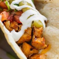 Sombrero Chicken Taco · A SOMBRERO FAVORITE! OUR SIGNATURE MARINATED CHICKEN - One Taco, on a corn tortillas with ch...