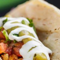 Chorizo Taco · CRISPY CHORIZO, PACKED WITH FLAVOR! SPICED WITH A TANG & HINT OF SMOKE - One Taco on a corn ...