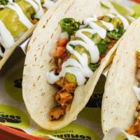 Al Pastor Taco Trio · Three Tacos - A STREET FOOD CLASSIC - MEXICO CITY STYLE MARINATED PORK WITH FRESH PINEAPPLE ...