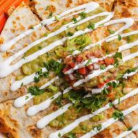 Shrimp A La Plancha Quesadilla · A 10” flour tortilla filled with melted mexican cheese and your choice of filling. Topped wi...