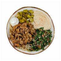 Chicken Shawarma Bowl · Chicken shawarma, hommus, tabbouleh, brown rice, garlic sauce & pickles. (gluten-free, dairy...