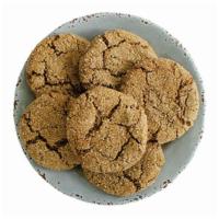 Ginger Molasses Cookie · robust molasses flavor brimming with ginger, cinnamon, and cloves. (vegan)