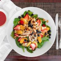 Starburst Spinach Salad · Baby spinach, fresh fruit, candied walnuts and Goat cheese.