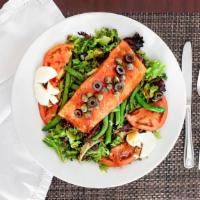 Grilled Salmon Nicoise Salad · Grilled salmon, greens, green beans, tomatoes, potatoes, black olives, capers and balsamic v...