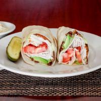 Sliced Turkey Wrap · Bacon, lettuce, tomato, and Russians dressing. Served with choice of side.