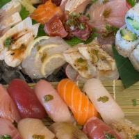 Sushi & Sashimi Platter Premium · Six pieces of classic roll, 12 pieces nigiri, 21 pieces sashimi.