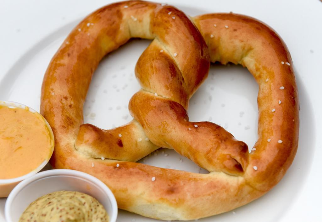 Jumbo Pretzel · Made fresh daily! Served with 
homemade queso and IPA mustard