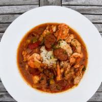 Louisiana Red Jambalaya · Sauteed chicken, gulf shrimp, andouille sausage, tomato, onion and roasted peppers simmered ...
