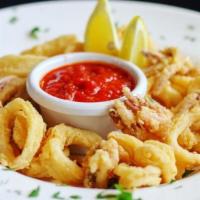 Fried Calamari · Lightly-dusted, fried to a golden brown, served with marinara.