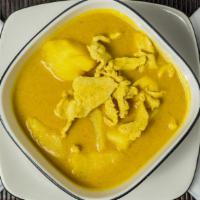 Yellow Curry · Spicy. Your choice of selected protein cooked with carrot, potatoes, and onion in an exotic ...