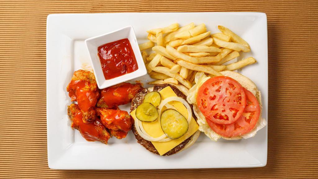 Cheeseburger + 4 Wings Combo · 1/4 grilled beef patty, cheese, homestyle dressing, fresh lettuce, tomato, pickles and onion and 4  pcs of golden-brown wings fried and tossed in the sauce of your choice. Combo comes with a side of French Fries and a 12 oz. drink.