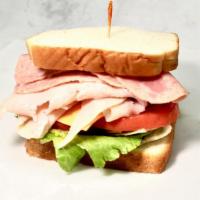 Cold Cut Sandwich · Ham or turkey with mayonnaise, lettuce, tomato, cheese on bread or toast bread.
