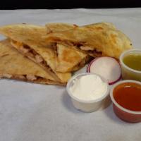Quesadilla · Warm flour tortilla with Cheese, your choice of meat and sour cream.