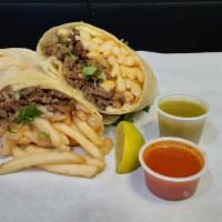 Cali Burrito  · flour tortilla with fries, your choice of meat , onions, cilantro, and cheese.