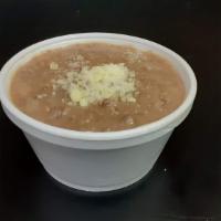 Beans · Side Refried beans 8oz. topped with a little cotija cheese