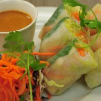 Fresh Salad Rolls · Fresh rolls filled with basil, carrot, lettuce, and rice noodle served with peanut sauce.
