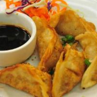 Gyoza · Japanese pot stickers with chicken.  Steamed or fried