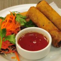 Crispy Spring Rolls · Golden crisp fried chicken and vegetable rolls in a rice paper wrapper served with sweet and...