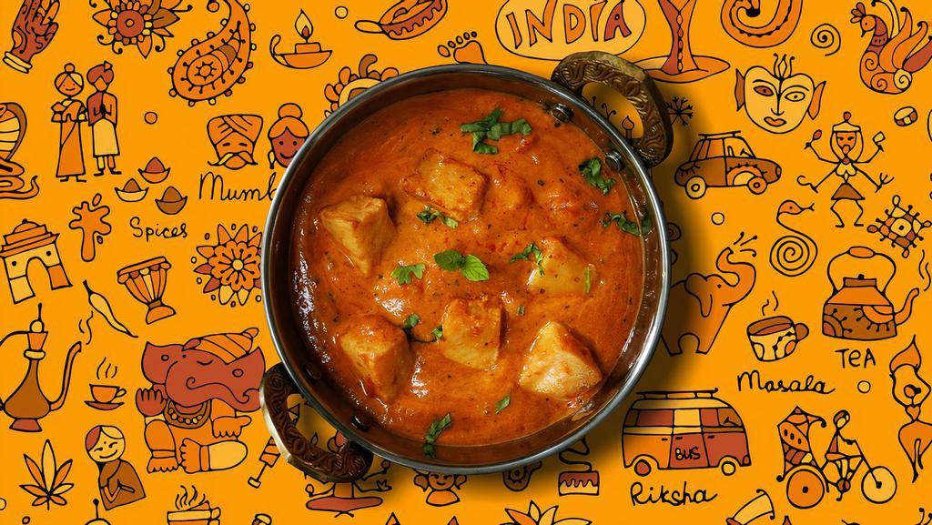 Tikka Masala Tango · Char grilled chicken morsels slow cooked in a rich onion and tomato gravy with generous amounts of butter served with a side of aromatic basmati rice