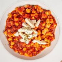Gnocchi · House made ricotta gnocchi with your choice of tomato sauce or pink cream sauce.