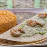 Cancun Enchilada · A tortilla filled with a mix of crab, scallops and fish topped with three jumbo shrimps, gre...