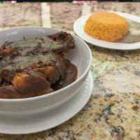 Mole Poblano · Served with Chicken, rice, beans and corn tortillas