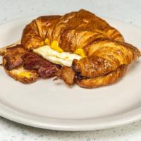 Breakfast Croissant · Ham, egg, cheddar cheese on a delicious croissant.