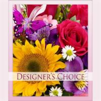 Designer'S Choice Vase Arrangement#1 · Seasonal flowers hand-crafted in a glass vase, colors may vary.