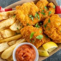 Fried Shrimp Basket · Jumbo gulf shrimp, breaded and fried to perfection. Served with cocktail sauce, lemon, and F...
