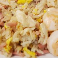 House Special Fried Rice · Made with chicken, shrimp, and ham.