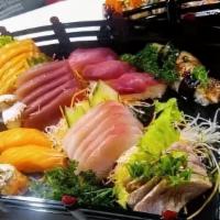 Sashimi Deluxe · 30 pcs assorted slices of raw fish.