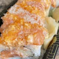 Spicy Titanic Roll · Hot. Spicy salmon, scallion roll topped with spicy salmon & tempura flakes.