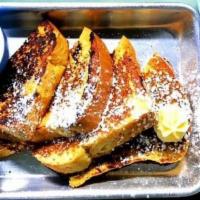 French My Toast · Golden-brown french toast with whipped honey butter and maple syrup.