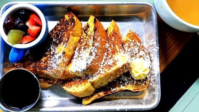 French My Toast · Golden-brown french toast with whipped honey butter and maple syrup.