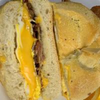 The Jersey Sandwich · Your choice of meat (Taylor ham, bacon, turkey bacon or sausage), two large eggs and two sli...