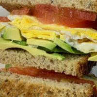 Avocado Toast · Enjoy a half of an avocado, two eggs, tomatoes and your choice of toast.  Add your favorite ...