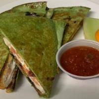 Veggie Quesadilla · Three eggs, onions, tomatoes, peppers, pepper jack cheese and cheddar cheese all grilled in ...