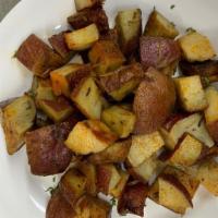 Roasted Potatoes · Get a portion of our roasted potatoes seasoned with rosemary paprika salt and pepper.