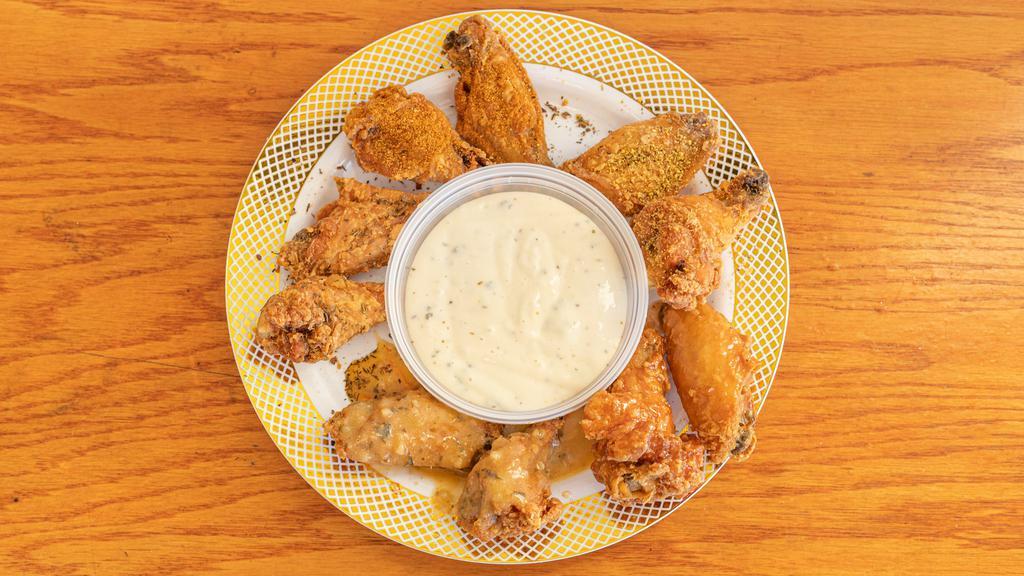 6 Piece Special Wings · Cooked wing of a chicken coated in sauce or seasoning.