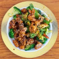Dragon & Phoenix · Shrimp with mixed vegetables on one side and General Tso's chicken on the other side. Hot an...