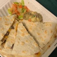 Classico Quesadilla · Large flour tortilla filled with 