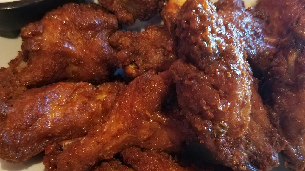 Wings · 1lb fried or grilled wings tossed in your choice of Buffalo, BBQ, Old Bay, Plain, or Jerk (jerk grilled only).