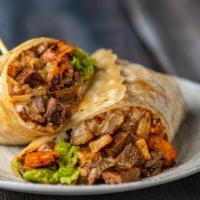 Surf & Turf Burrito · This classic has returned with steak, shrimp, potatoes, pico, hot salsa, chipotle ranch, cil...