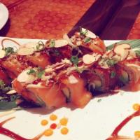 Crush On Yuki Maki · Spicy crunchy yellowtail avocado inside, topped with salmon eel wasabi mayo sweet sauce and ...