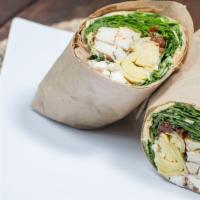Power Wrap · Golden quinoa, black beans, roasted red peppers, red onions, feta cheese, avocado, miso dres...