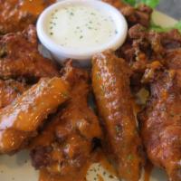 10 Traditional Wings · Jumbo crispy bone-in wings tossed in your choice of sauce: Parmesan Garlic, Sweet Chili, Buf...