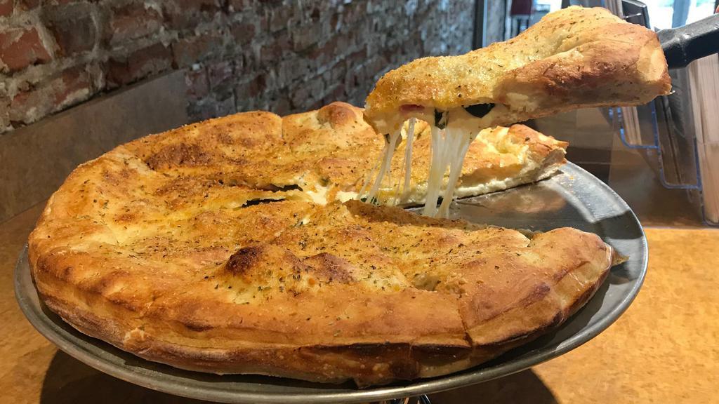 Family Cyo Calzone · Start with mozzarella and ricotta cheese and then choose up to 4 toppings for free to personalize your calzone
