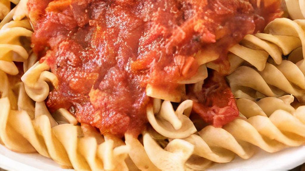 Kids Pasta · Corkscrew pasta served with a garlic roll and you choice of marinara or Alfredo sauce, add grilled chicken $2 or meatball $1.5.  Comes with one kids side option